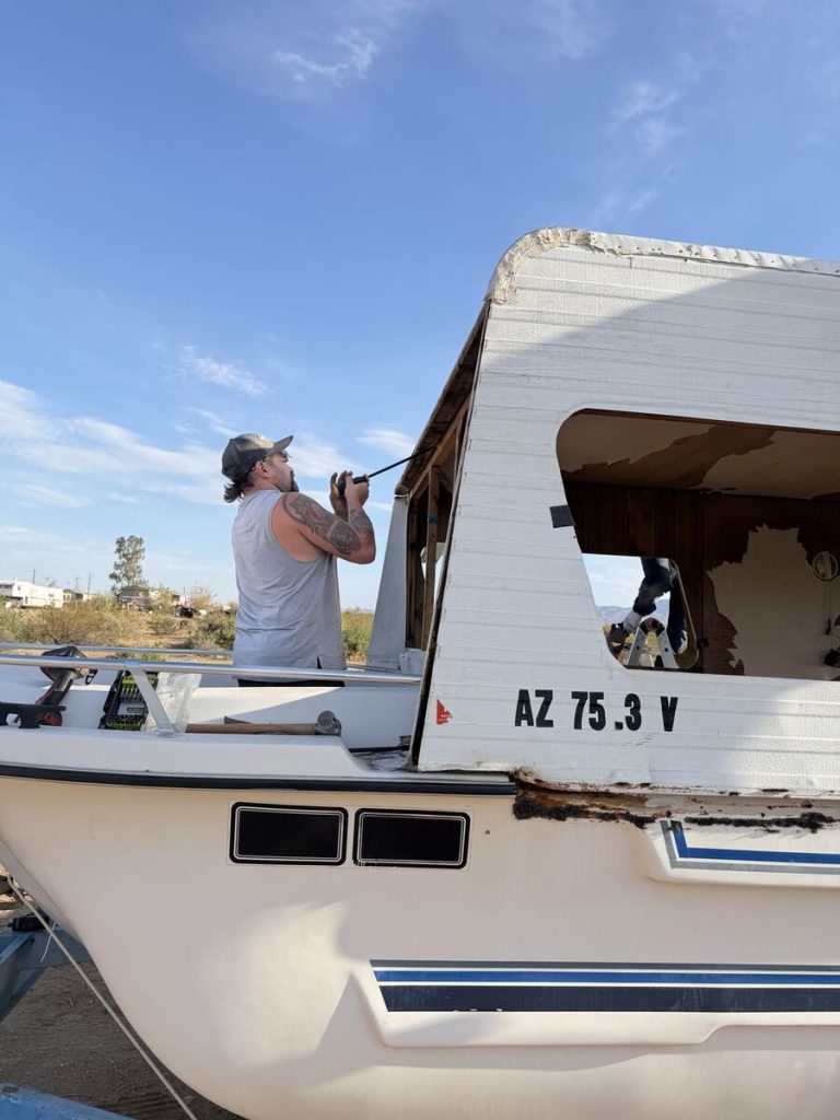 Removing the forward section of the old boat cabin